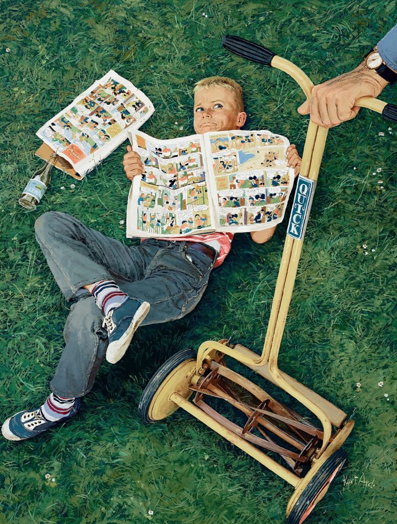 Little boy laying on grass reading comics and looking up at his father, who has a hand on a manual lawn mower