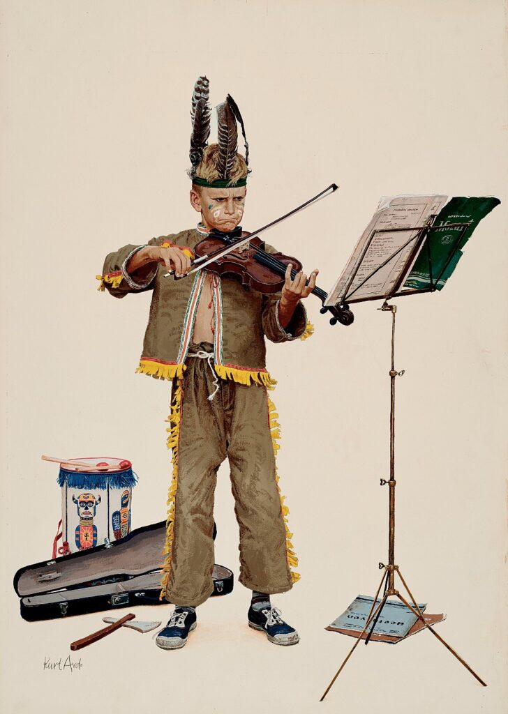 Little boy dressed as a Native American scowling as he tries to play the violin and read music off of the music stand