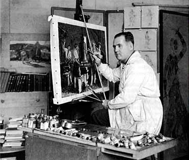 Frank reilly in his studio holds brushes and paints a canvas on an easel